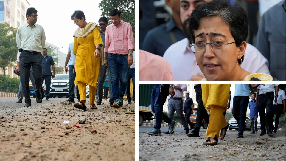 Delhi Chief Minister Atishi inspects condition of a road at NSIC Estate, Okhla Industrial Estate, in New Delhi, Monday, Sept. 30, 2024.