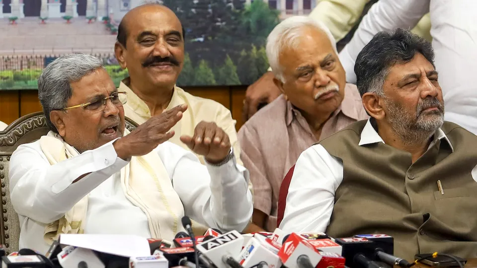 Karnataka Chief Minsiter Siddaramaiah with his Deputy DK Shivakumar addresses a press conference after Karnataka High Court dismissed his petition challenging the approval given by Governor Thaawarchand Gehlot for an investigation against him in the MUDA site allotment case, in Bengaluru, Tuesday, Sept. 24, 2024.