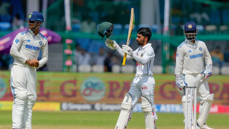 Bangladesh's batter Mominul Haque celebrates his century during the fourth day of the 2nd Test cricket match between India and Bangladesh, at the Green Park stadium, Kanpur, Monday, Sept. 30, 2024.