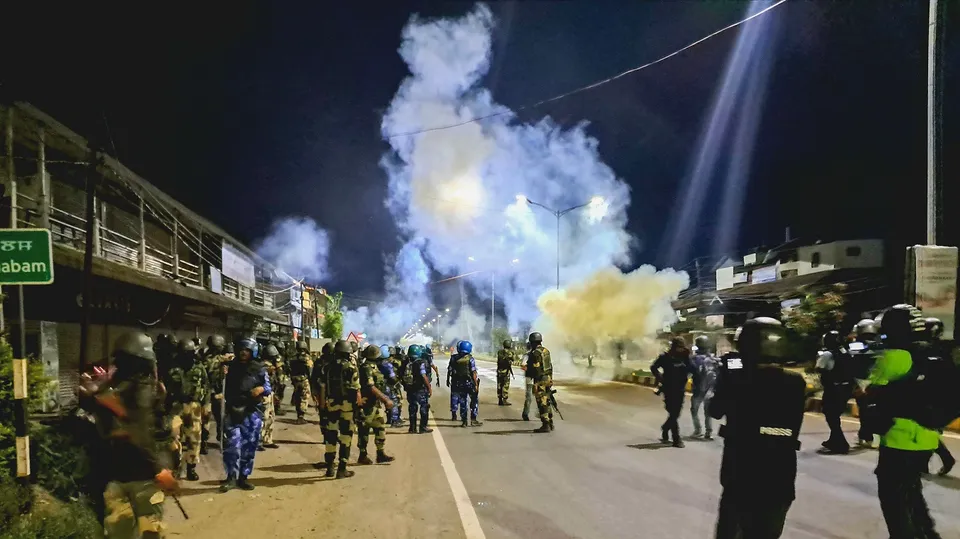 RAF and CRPF personnel guard after a mob tried to attack the ancestral house of Chief Minister N Biren Singh at Heingang in Imphal East district