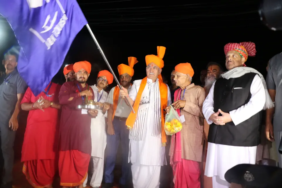 Jammu and Kashmir Lt Governor Manoj Sinha flags off the first batch of pilgrims for the Amarnath Yatra 2023 after conducting a puja at the Bhagwati Nagar base camp, in Jammu, Friday