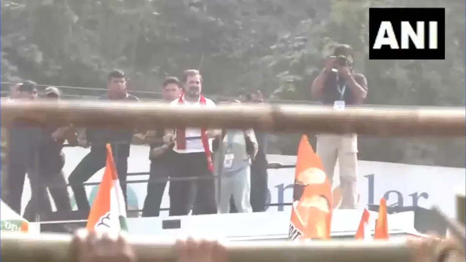 Rahul Gandhi watches as Congress workers break police barricades in Guwahati