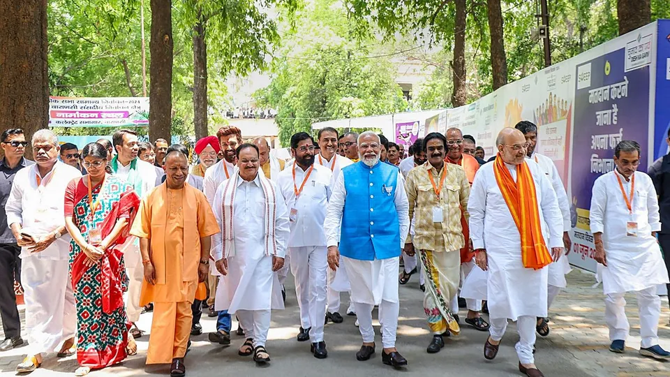 Prime Minister Narendra Modi accompanied by Union Home Minister Amit Shah, BJP President J P Nadda, UP CM Yogi Adityanath and other NDA leaders comes out after filing his nomination papers for Lok Sabha polls, in Varanasi, Uttar Pradesh, Tuesday, May 14, 2024.