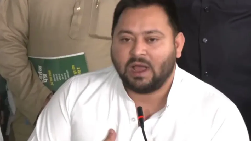 Former deputy chief minister Tejashwi Yadav releasing the RJD's election manifesto 'Parivartan Patra'