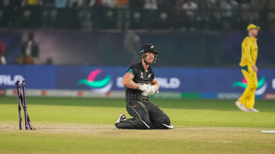 New Zealand's J Neesham is run out during the ICC Men’s Cricket World Cup 2023 match between Australia and New Zealand, at HPCA Stadium, in Dharamshala, Saturday, Oct. 28, 2023.