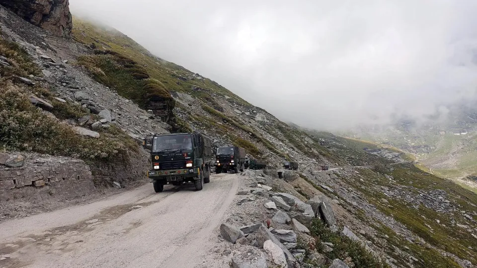 Army Vehicles Carrying Military Material For Soldiers Deployed Along The Border From Rohtang Pass On Manali-Leh Highway. 