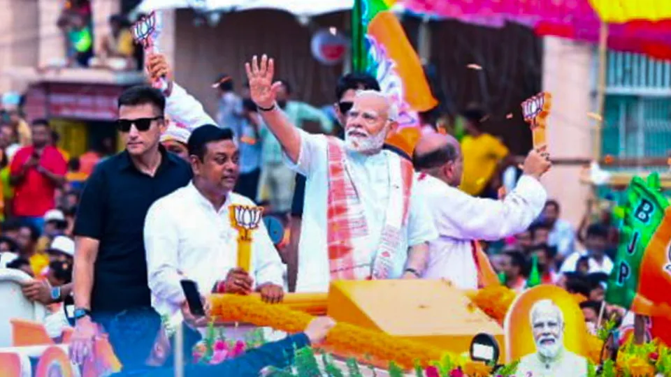 Prime Minister Narendra Modi during a roadshow for Lok Sabha elections, in Puri, Monday, May 20, 2024