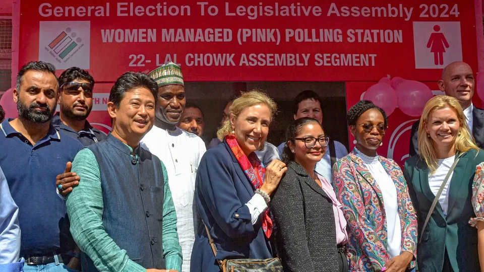 Diplomats from foreign missions at a pink polling station to witness the voting during the second phase of J & K Assembly polls, in Srinagar, Wednesday, Sept. 25, 2024.
