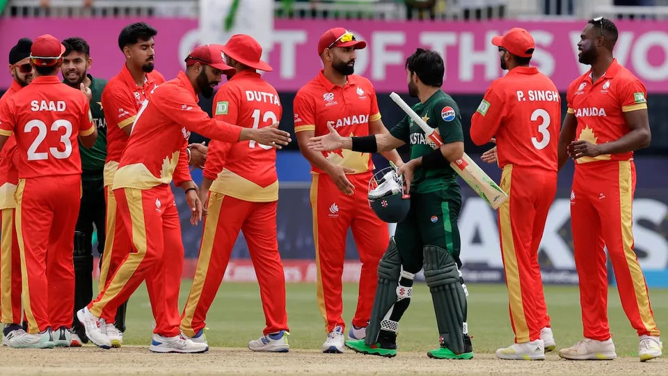 Players of both teams greet each other at the end of the ICC Men's T20 World Cup cricket match between Pakistan and Canada at the Nassau County International Cricket Stadium in Westbury, New York, Tuesday, June 11, 2024.