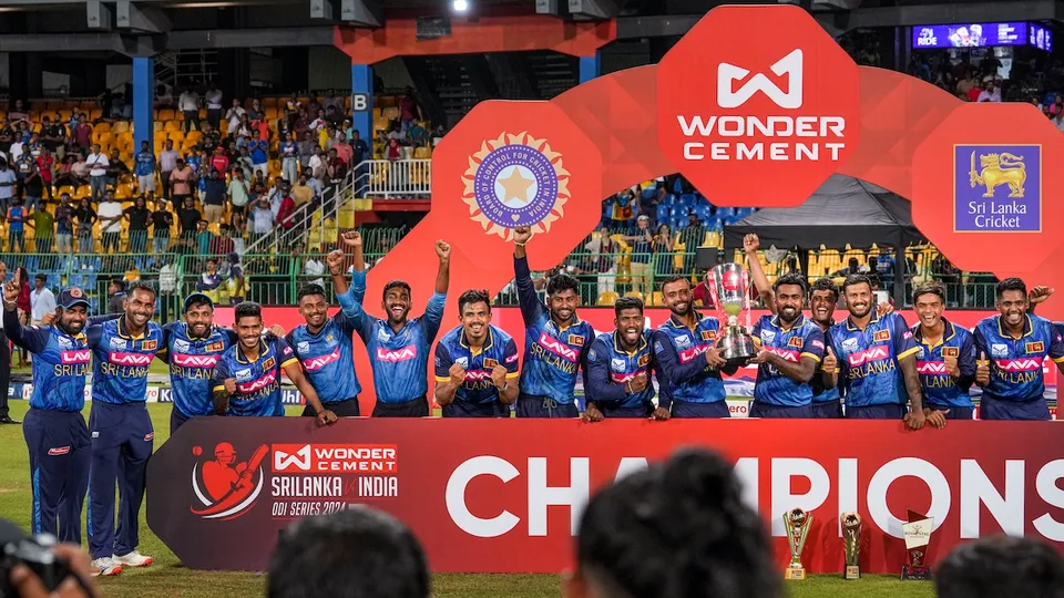 Sri Lankan players pose with the trophy after winning the ODI cricket series against India, at the R. Premadasa International Cricket Stadium, in Colombo, Wednesday, Aug. 7, 2024. Sri Lanka won the match by 110 runs.