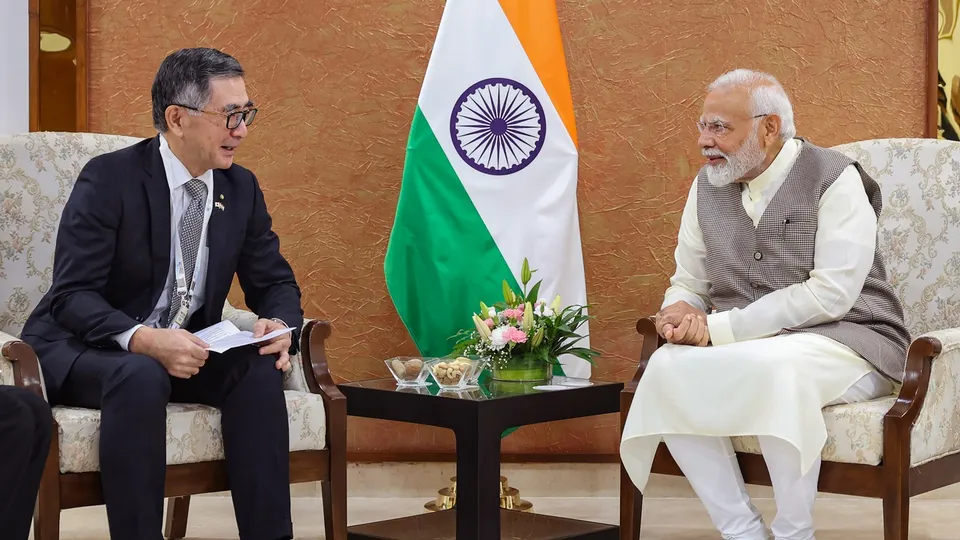 Prime Minister Narendra Modi in a meeting with Suzuki Motor Corp President Toshihiro Suzuki, in Gandhinagar