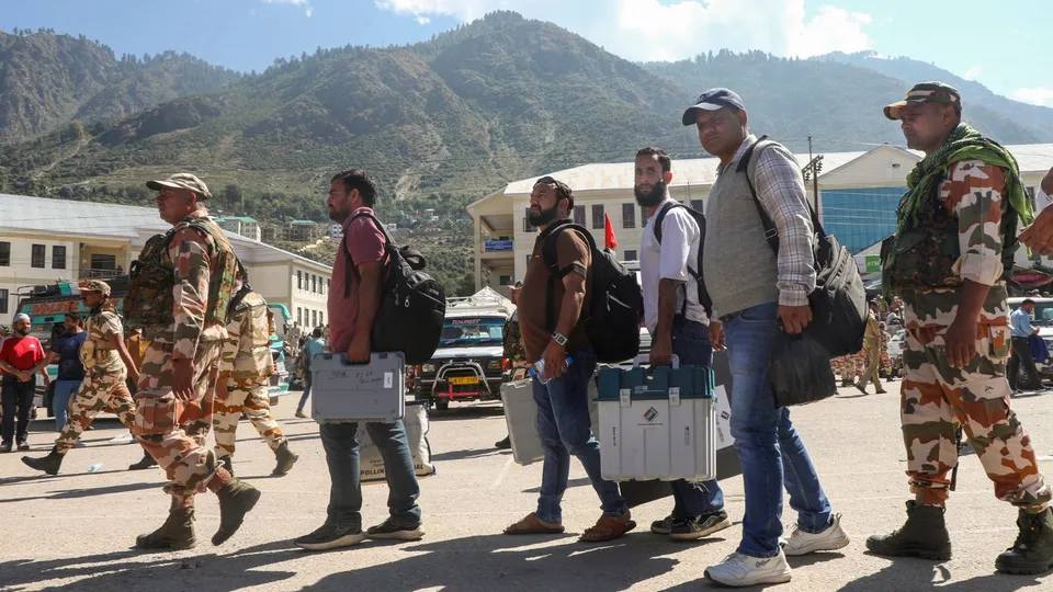 Polling officials leave for their respective polling stations on the eve of first phase of the Jammu and Kashmir Assembly election, in Kishtwar district, Tuesday, Sept. 17, 2024.