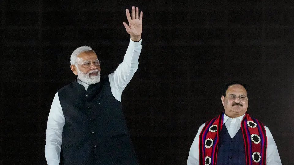 Prime Minister Narendra Modi and JP Nadda at a victory rally at BJP headquarters in New Delhi on Thursday
