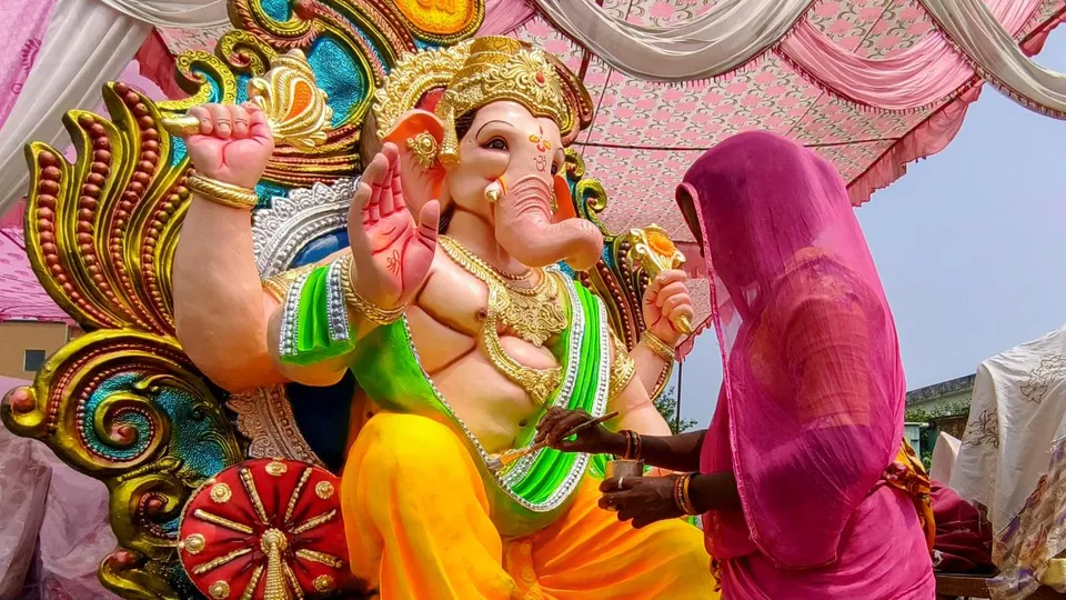 An artisan gives final touches to an idol of Lord Ganesh ahead of the Ganesh Chaturthi festival, in Amritsar, Thursday, Sept 5, 2024