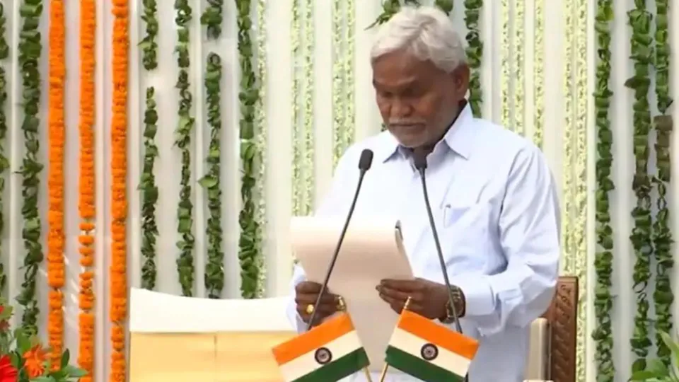 Former chief minister and JMM MLA Champai Soren takes oath as a minister in the newly formed Hemant Soren government, in Ranchi, Monday, July 8, 2024.