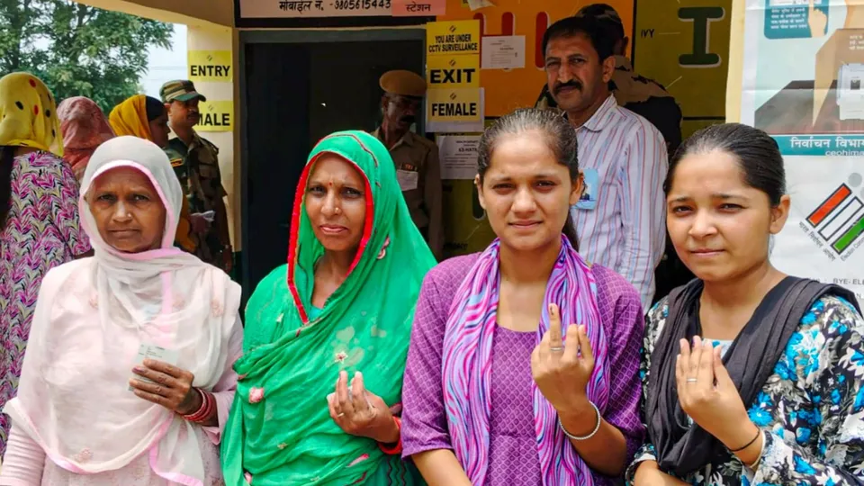 Voters show their fingers marked with indelible ink after casting their votes during the Nalagarh assembly bypoll, in Solan district of Himachal Pradesh, Wednesday, July 10, 2024.