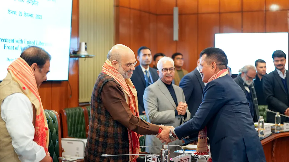 Amit Shah, Himanta Biswa Sarma and Home Secretary Ajay Kumar Bhalla with a member of United Liberation Front of Asom (ULFA) during signing of a peace accord between ULFA and the central and Assam governments, in New Delhi, Friday, Dec. 29, 2023.