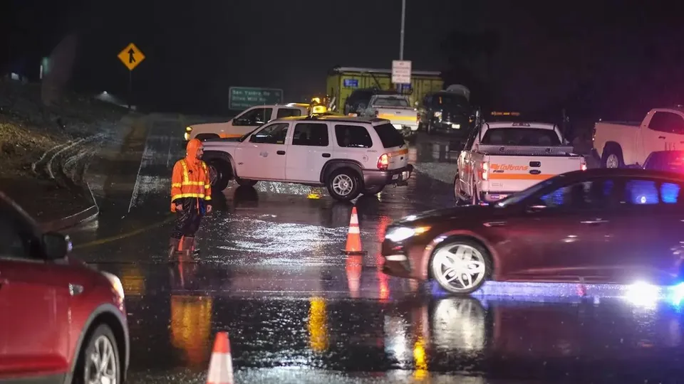Rainfall in the night wet roads