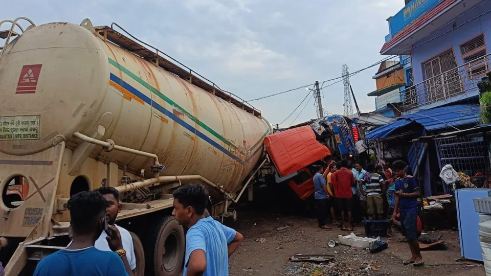 A tanker overturned on a roadside tea stall after a head-on collision with a bus in Odisha's Ganjam district on Thursday