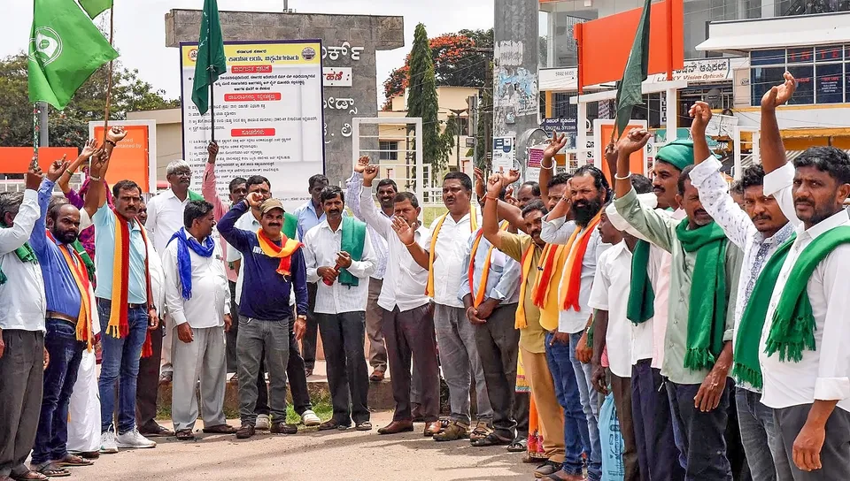 Pro-Kannada activists raise slogans during a protest against Cauvery Water Management Authority (CWMA) over its decision to ensure a flow of 5,000 cusecs of river water to Tamil Nadu till Sept. 29