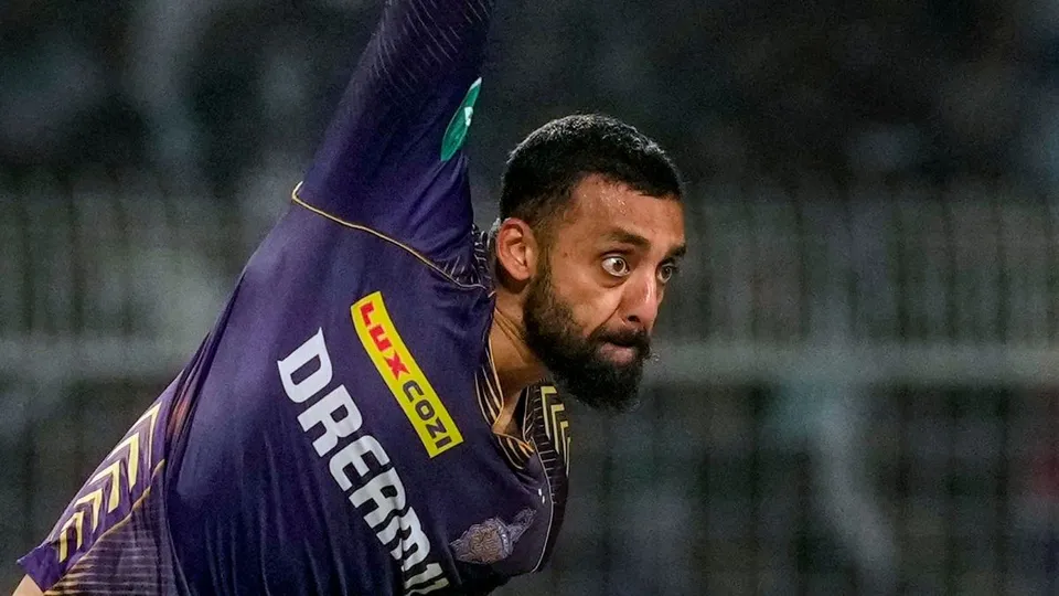 KKR' bowler Varun Chakravarthy bowls a delivery during the IPL 2024 T20 cricket match between Kolkata Knight Riders and Delhi Capitals, at the Eden Gardens, in Kolkata, Monday, April 29, 2024.