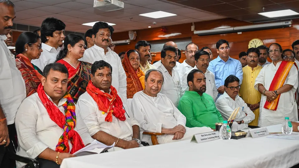 Biju Janata Dal candidates for Rajya Sabha Subhasish Khuntia and Debasish Samantray with party president Naveen Patnaik after filining their nomination papers, in Bhubaneswar