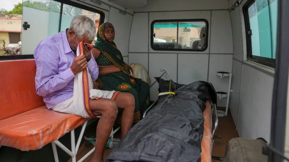 Family members mourn after receiving the body of a victim of the Hathras stampede that occured during a religious gathering, outside a hospital in Hathras district, Wednesday, July 3, 2024