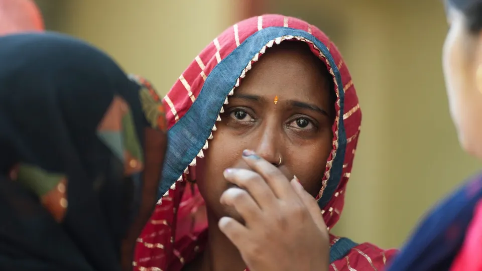 A relative cries at GTB hospital after a fire broke out in a residential building in Krishna Nagar area, in which three people were killed, in Delhi, Sunday, May 26, 2024