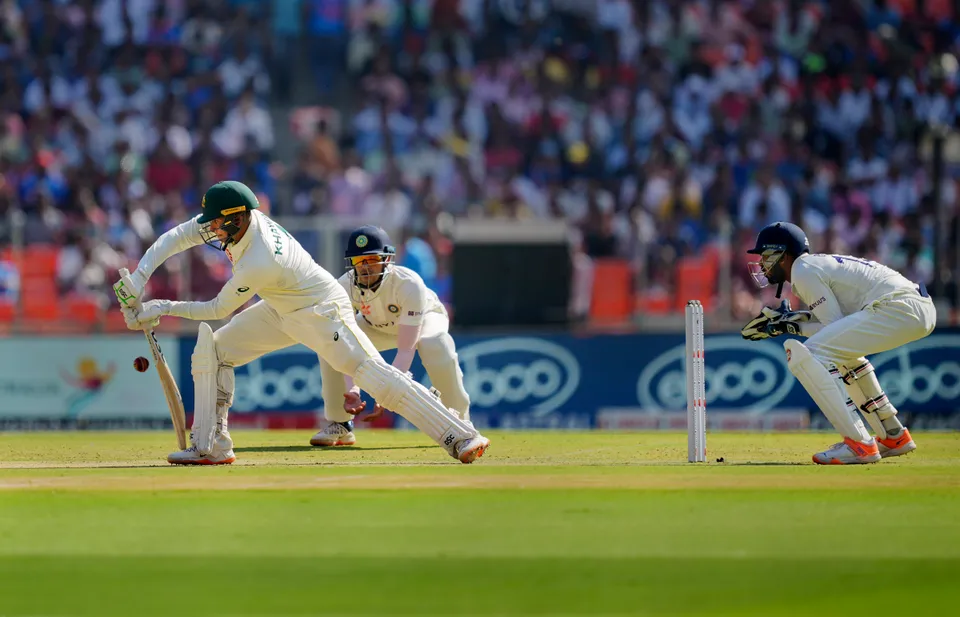 Australian batter Usman Khawaja plays a shot during the 1st day of the fourth test cricket match between India and Australia, at Narendra Modi stadium in Ahmedabad