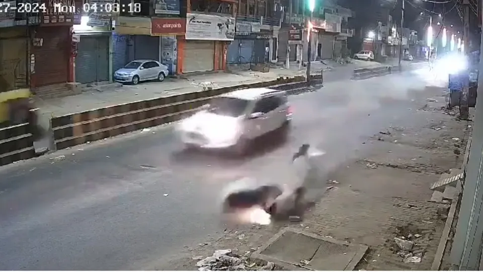 A man was seriously injured when a speeding car hit his scooter, dragging him for around 50 metres on Basai road in the early hours on Monday