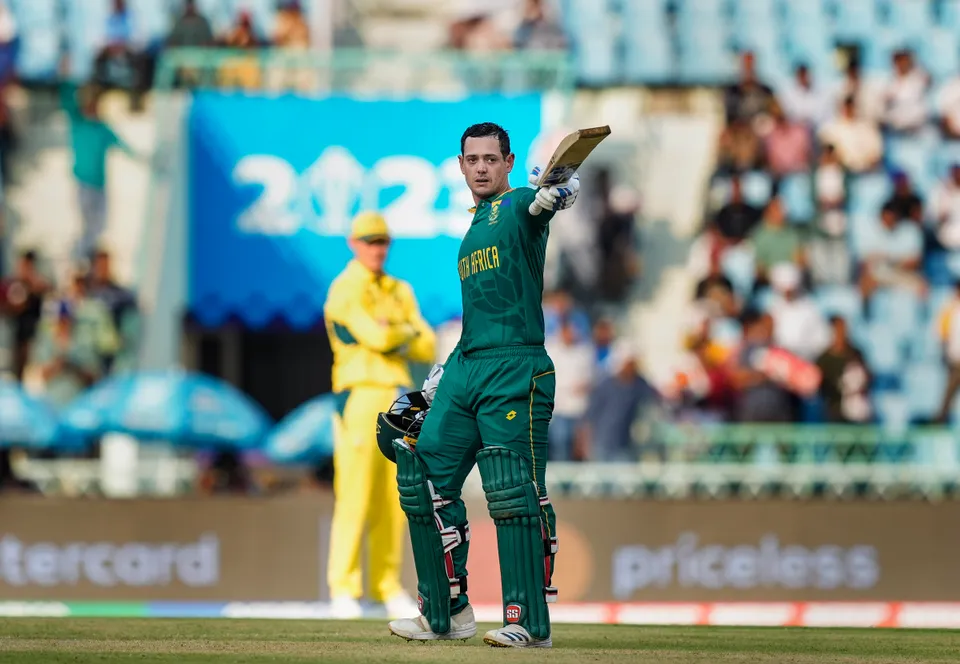 South Africa's Quinton de Kock celebrates his century during the ICC Men's Cricket World Cup 2023 match between Australia and South Africa
