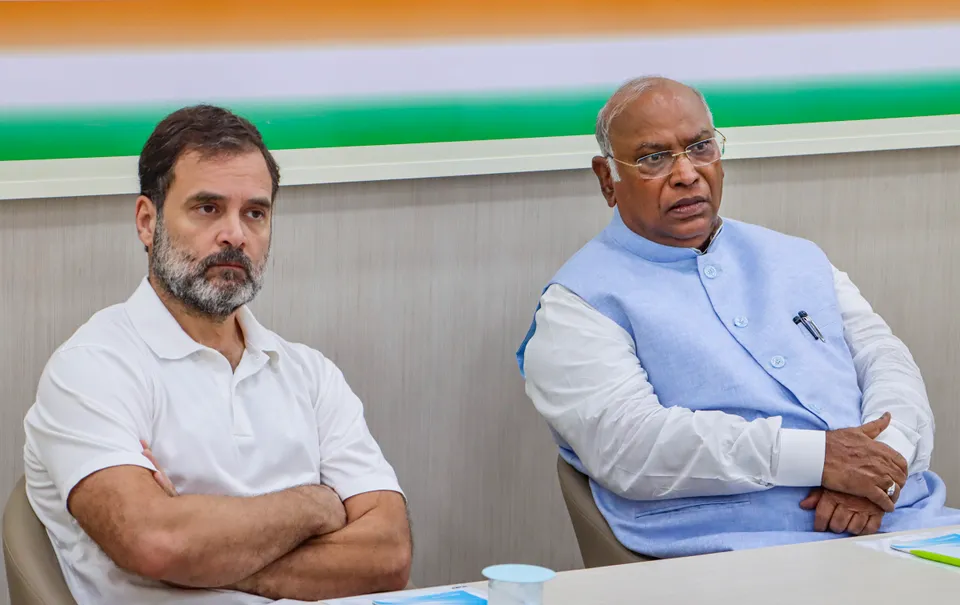 Congress President Mallikarjun Kharge with party leader Rahul Gandhi during a meeting on Uttarakhand, at the party headquarters in New Delhi, Thursday.jpg
