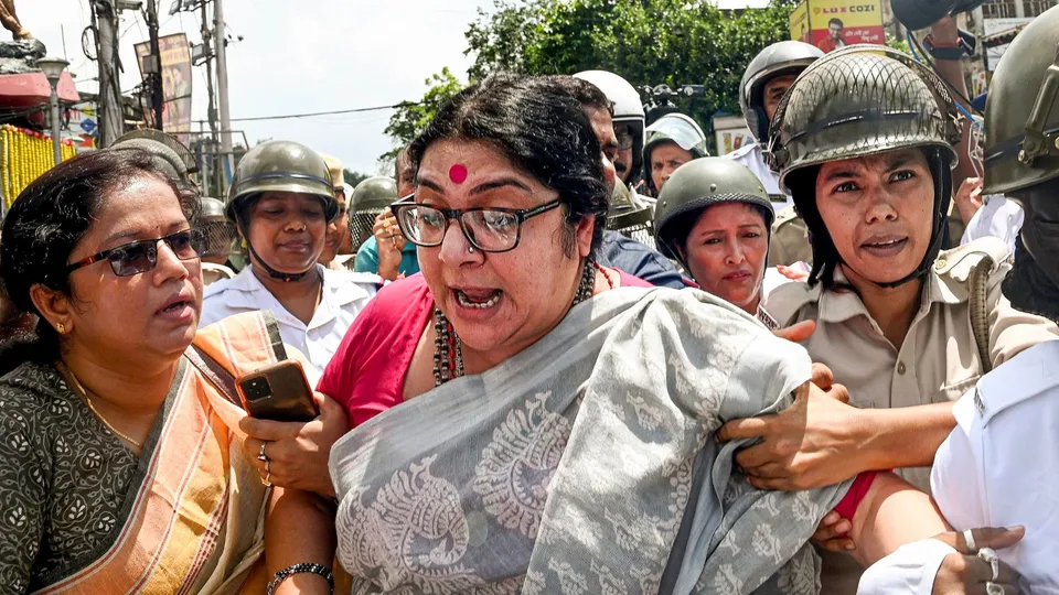 BJP leader Locket Chatterjee being detained during a protest rally amid the party's 12-hour general strike in Bengal to protest the police action Nabanna Abhijan rally, in Kolkata, Wednesday, Aug. 28, 2024.