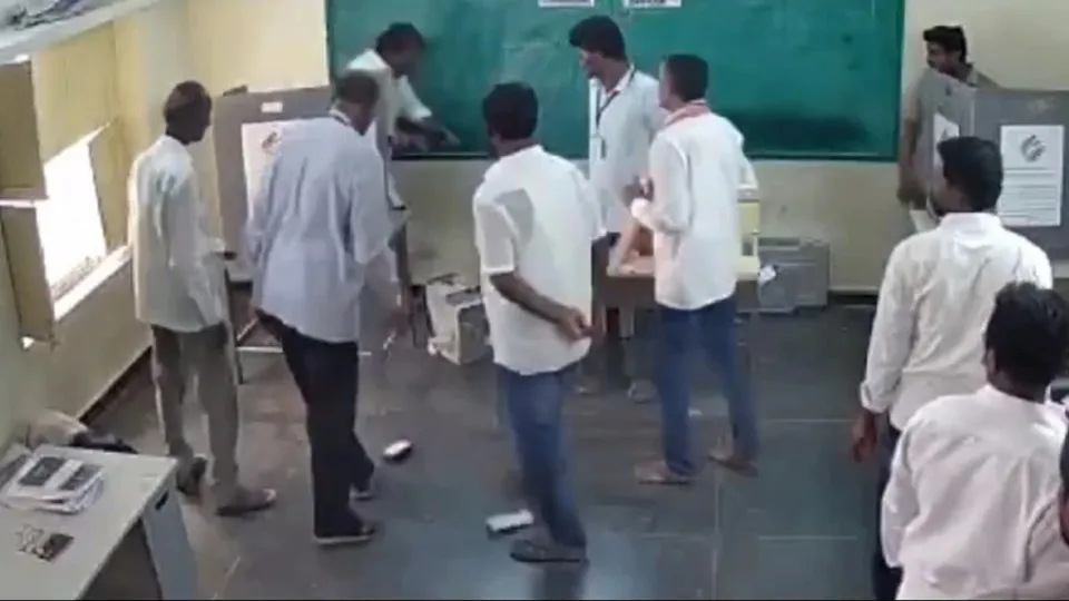 YSRCP MLA P Ramakrishna Reddy smashing EVM at a polling centre in Macharla constituency of Palnadu district