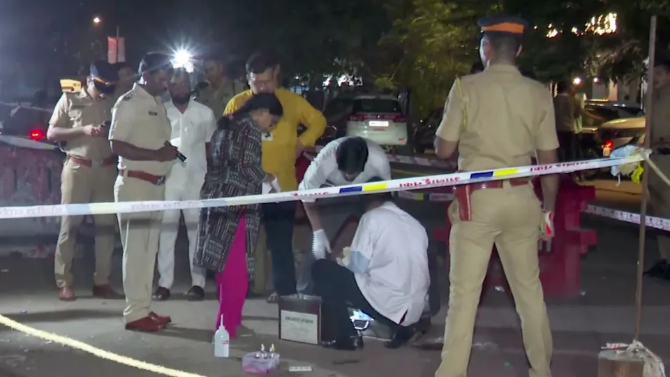 Forensic team investigates at the site where former Maharashtra minister Baba Siddique was shot dead by three assailants, in Mumbai, Saturday night, Oct. 12, 2024. 