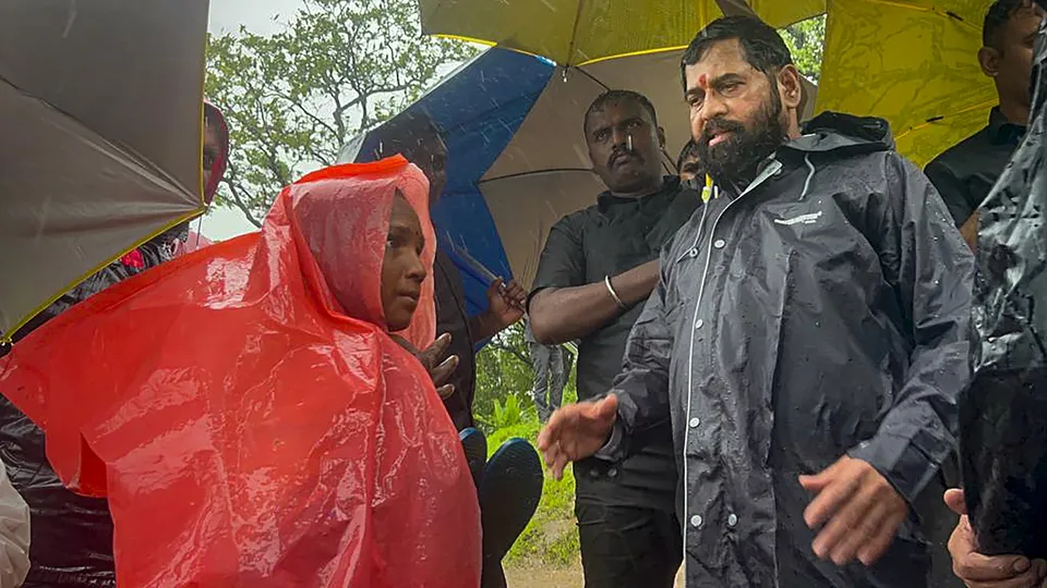 Maharashtra Chief Minister Eknath Shinde takes stock of the situation after a landslide at Irshalwadi village in Raigad district