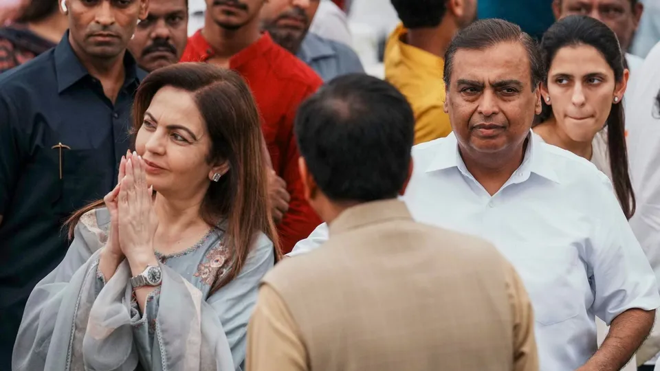 Reliance Industries chairman Mukesh Ambani with his wife Nita Ambani arrives to pay his last respects to industrialist Ratan Tata, at NCPA lawns in Mumbai, Thursday, Oct. 10, 2024.