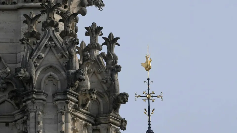 The cross and the rooster atop the Notre Dame de Paris cathedral spire, Thursday, March 14, 2024 in Paris