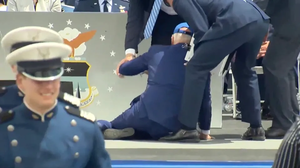 Joe Biden falls on stage