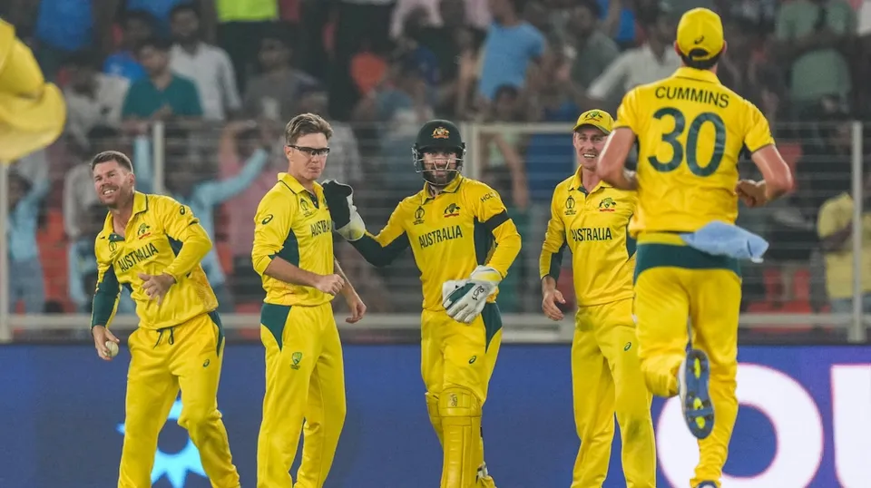 Australia's bowler Adam Zampa celebrates the wicket of England's batter Moeen Ali during the ICC Men's Cricket World Cup 2023 match between Australia and England, at Narendra Modi Stadium, in Ahmedabad, Saturday, Nov. 4, 2023.
