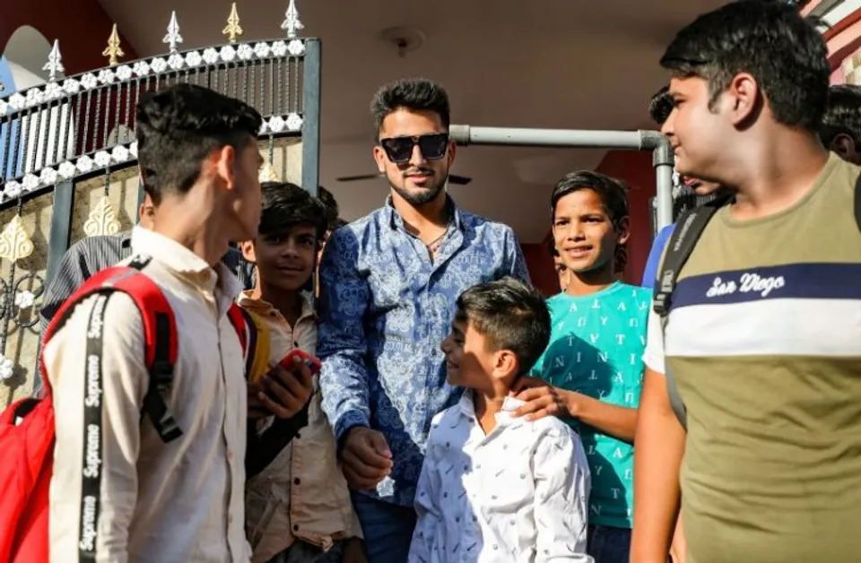 Cricketer Umran malik arrives at his home in Jammu after playing in Indian Premiere League