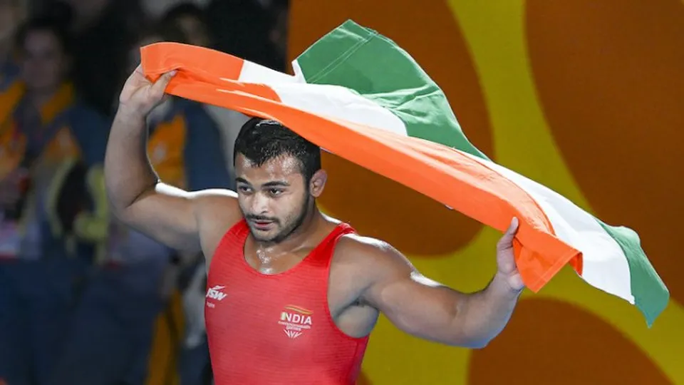 India's Deepak Punia (red) after winning against Pakistan's Muhammad Inam in the final of the Mens Freestyle Wrestling 86kg category event at Birmingham CWG on Friday