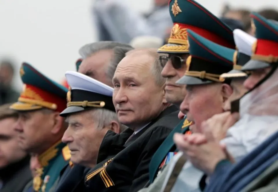 Vladimir Putin with Russian defense forces (file photo)