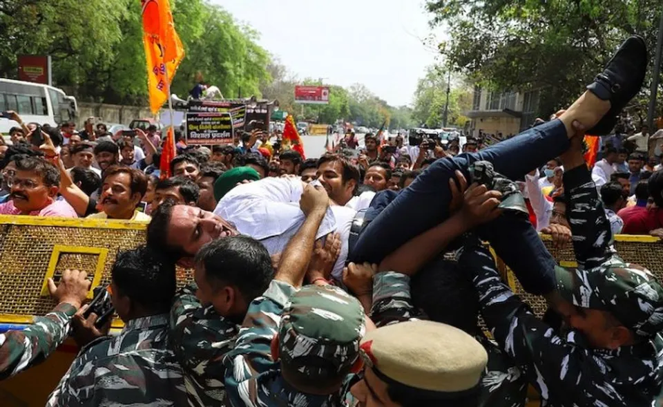 BJYM workers protesting over Arvind Kejriwal's statement on The Kashmir Files