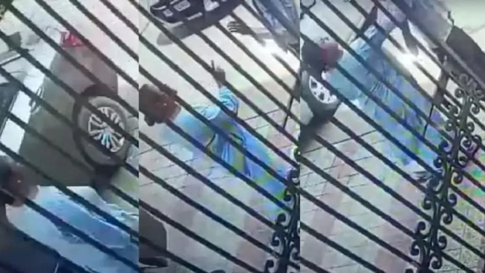 Videograb of Noida woman slappping guard