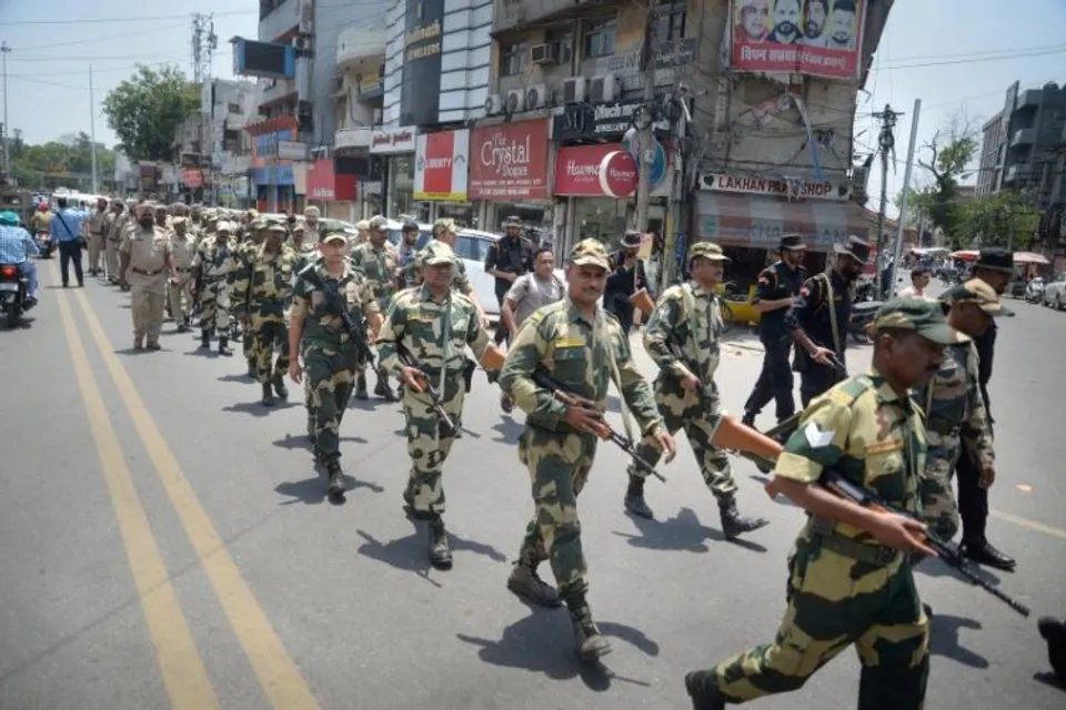 Security personnel hold a flag march, ahead of the anniversary of Operation Blue Star