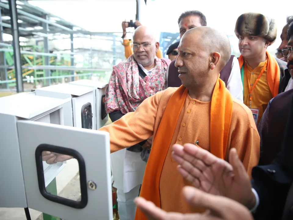 CM Yogi innaugrating the bio-CNG plant.jpeg