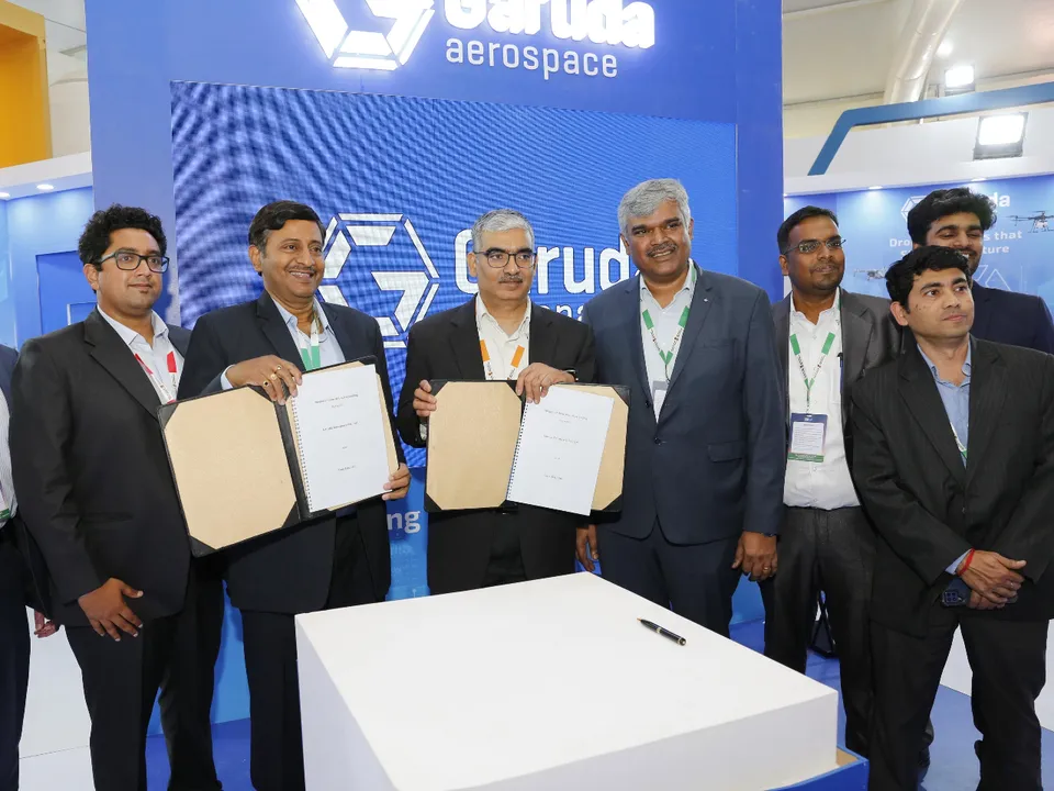 Tata Elxsi and Garuda Aerospace signing MOU.jpeg