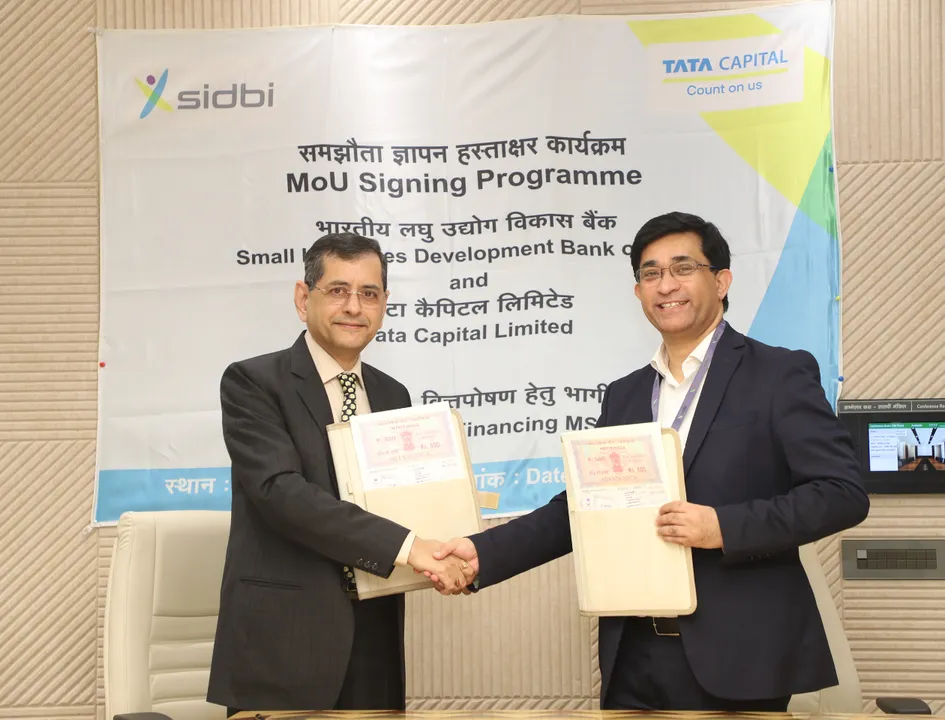 L to R - Shri Vivek Kumar Malhotra, Chief General Manager, SIDBI and Shri Vivek Chopra, Chief Operating Officer, Retail Finance, TCL.JPG