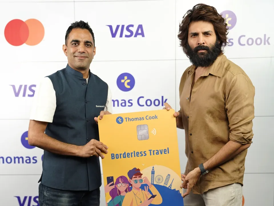 Bollywood star Kartik Aaryan with Deepesh Varma, Executive Vice President - Foreign Exchange, Thomas Cook (India) Limited (1).JPG